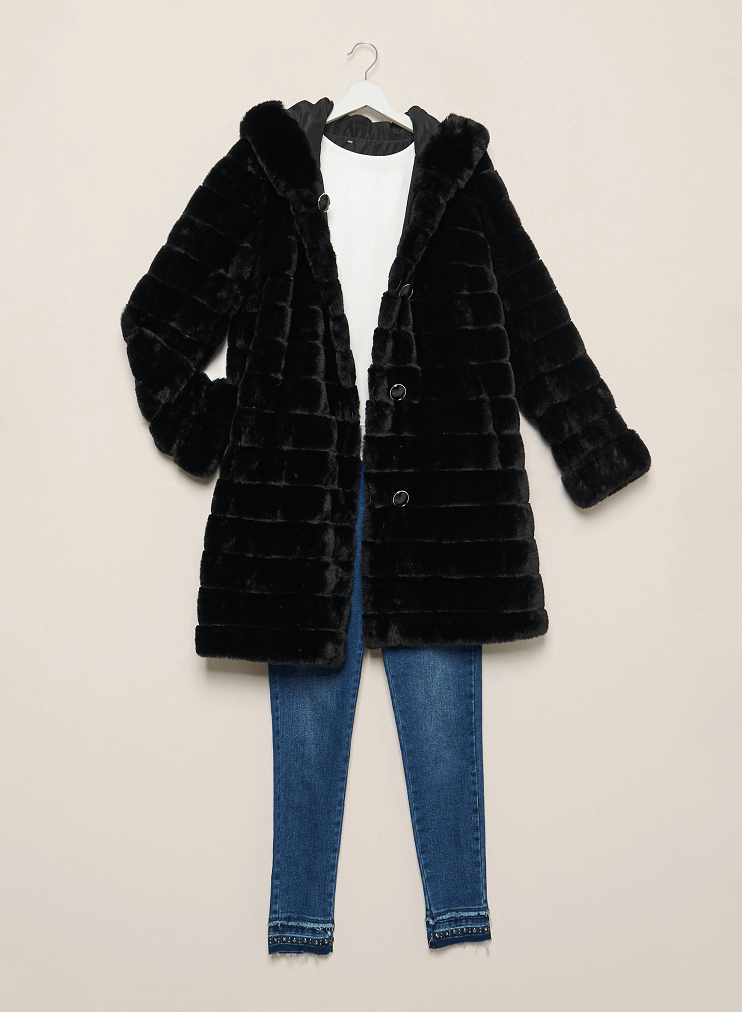 Faux fur coat styled with top and pants.