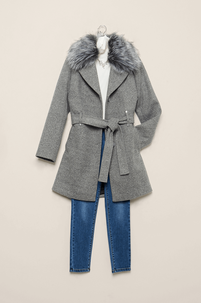 Long faux fur collar coat styled with top and pants.